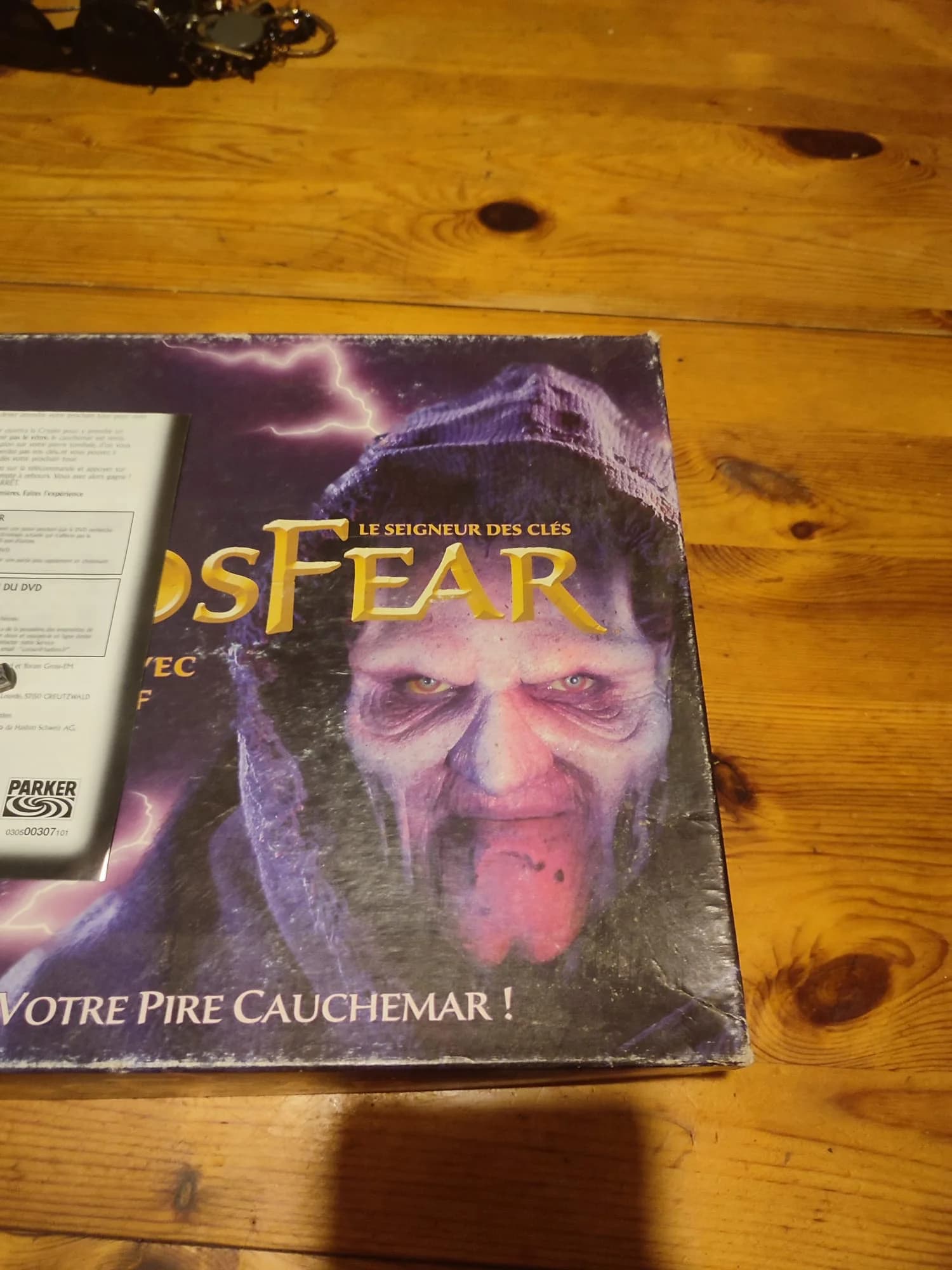 Boîte violette Atmosfear Le Seigneur des Clés et livret Parker mentionnant le DVD, édition française 2005